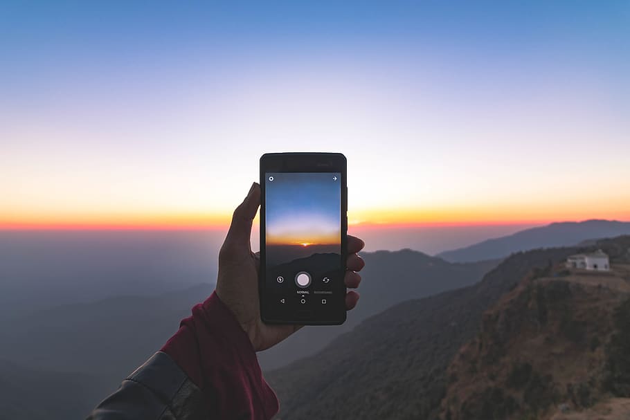 cellphone, mobile, touchscreen, hand, mountains, view, landscape HD wallpaper