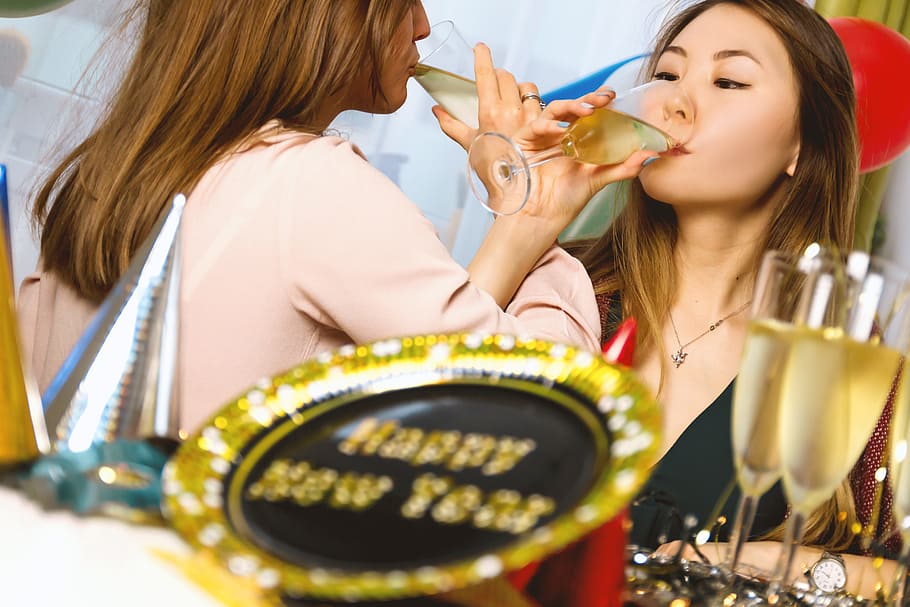Two young girls celebrate. Happy New Year, two people, women HD wallpaper