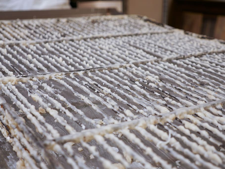 Bakery racks covered in glaze., food, donut, production, closeup HD wallpaper