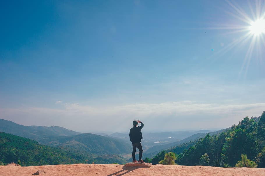 Man Looking on the Cliff, daylight, high, mountain peak, mountain range HD wallpaper