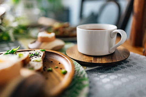 Breakfast served with tea, bread and eggs, table, cup of tea HD wallpaper