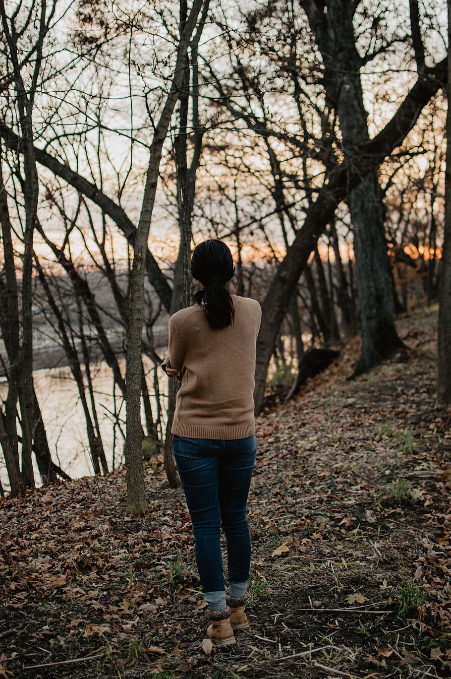 woman standing near trees, person, human, apparel, clothing, pants HD wallpaper