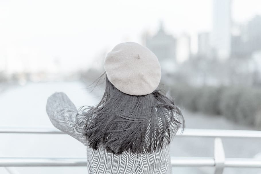 woman looking at a river while standing on bridge, hat, one person HD wallpaper