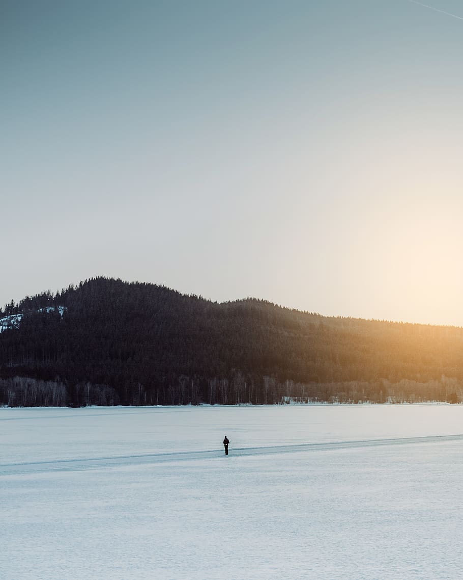 person standing on snow field, nature, outdoors, human, people HD wallpaper