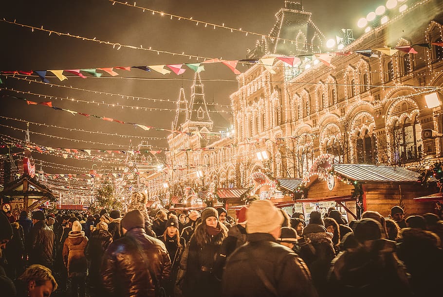 building with yellow string lights, person, human, crowd, city HD wallpaper