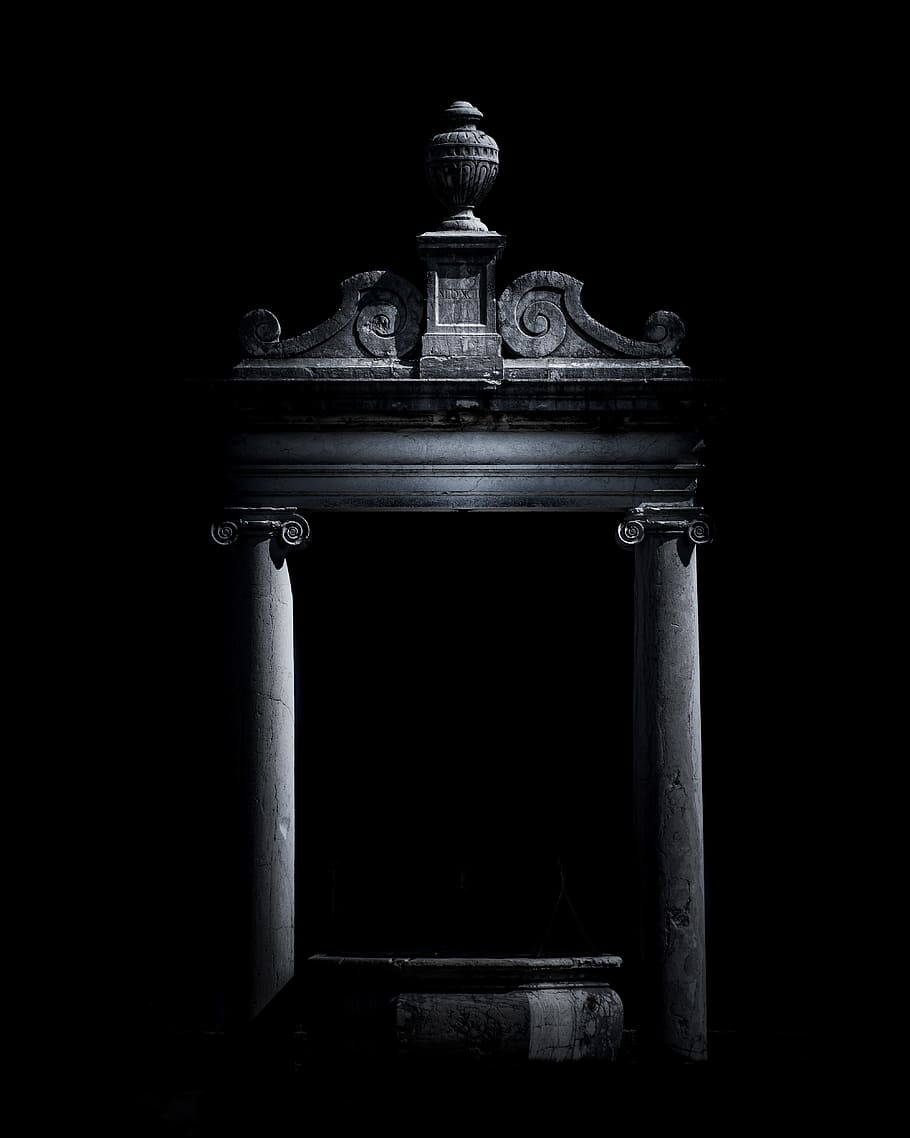 gray puja mandir altar on dark background, gate, spotlight, glow