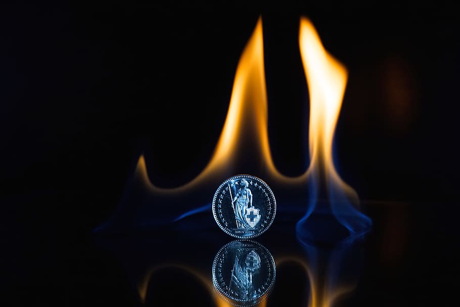 Round Silver-colored Coin on Black Surface With Flame, art, creative HD wallpaper
