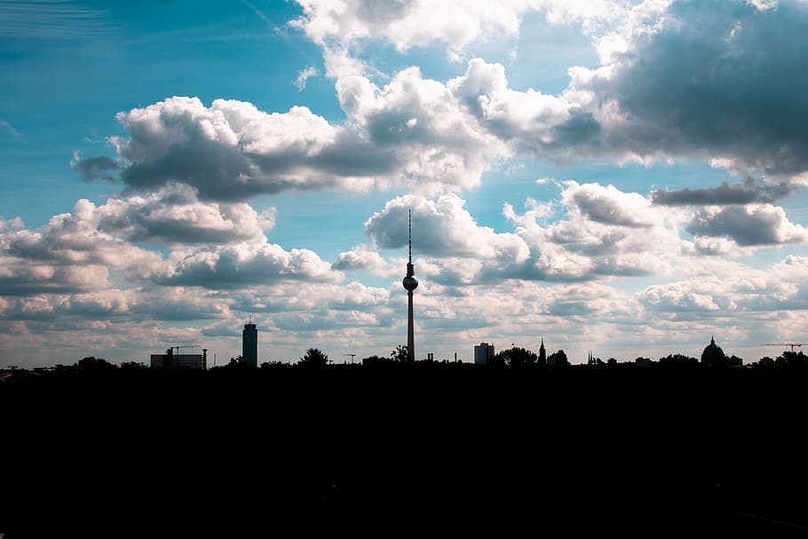 tower under white sky, cloud, nature, weather, cumulus, outdoors HD wallpaper