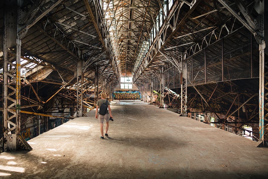 person inside warehouse, architecture, one person, built structure HD wallpaper