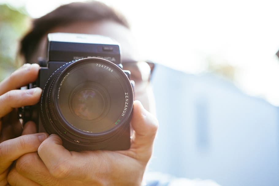 Person Holding Camera during Dayime, boy, bronica, filming, man HD wallpaper