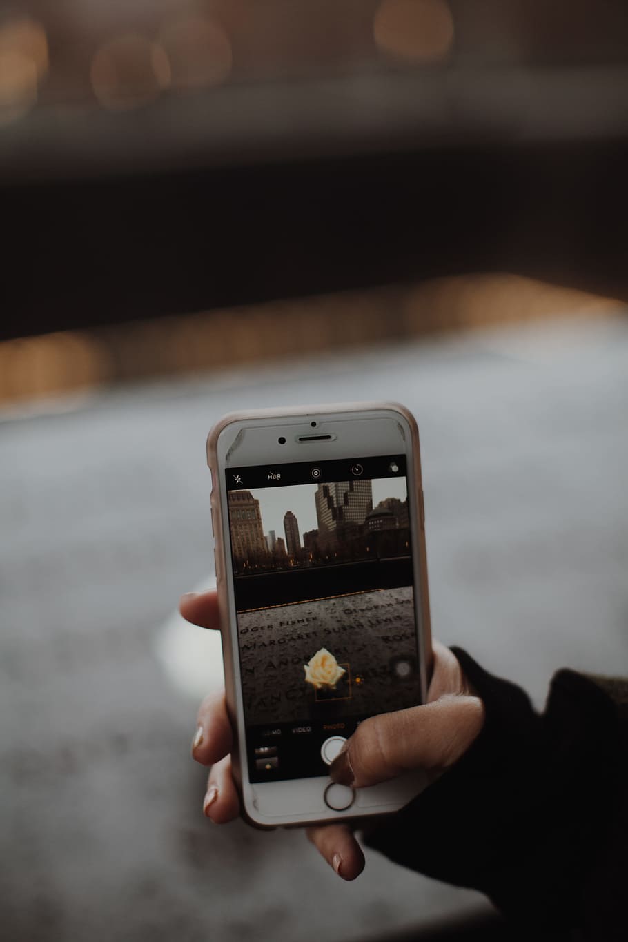 Person Holding Gold Iphone 6 and Brown Case, blurred background HD wallpaper
