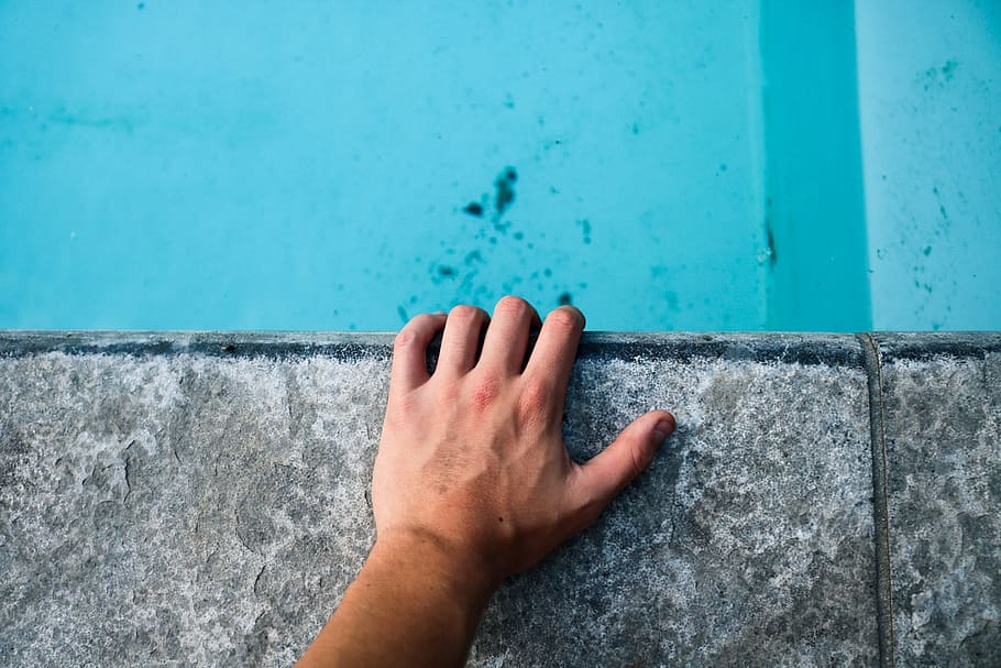 Person's Hand on Gray Floor, arm, concrete floor, concrete surface HD wallpaper
