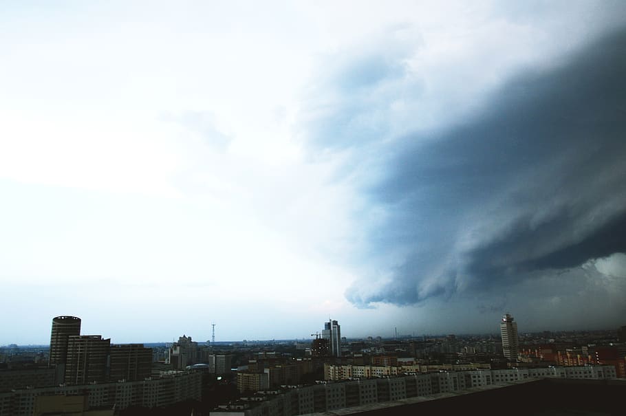 grey clouds over city skyline, nature, outdoors, weather, scenery HD wallpaper
