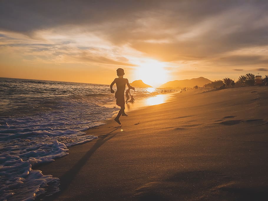Boys Playing on Seashore, backlit, beach, children, clouds, dawn HD wallpaper