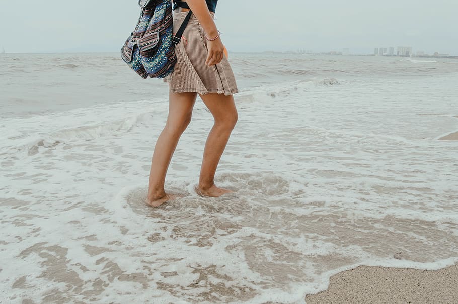 Photo of Person On Seashore, backpack, beach, female, fun, leisure HD wallpaper