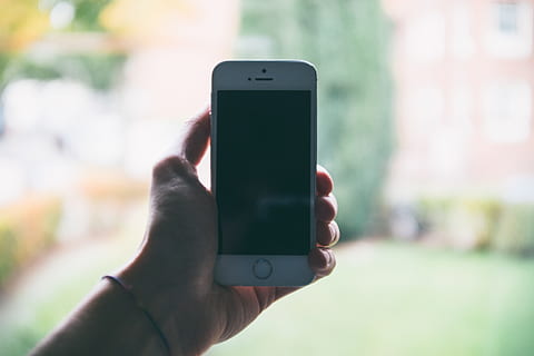 iPhone 5 in hand, app, application, business, communication, computer HD wallpaper