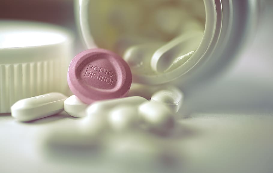 medication pill on white textile, indoors, close-up, no people HD wallpaper