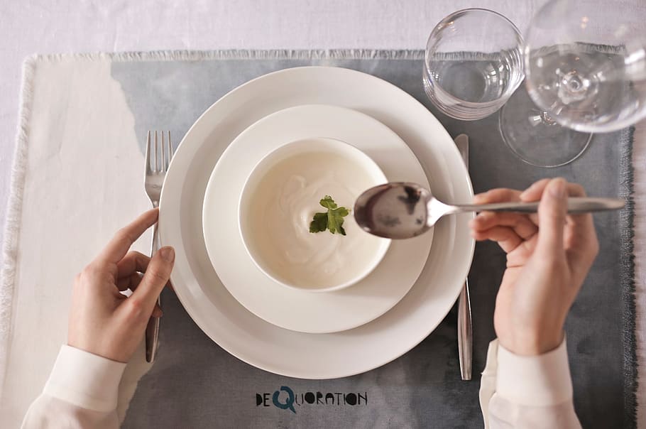 A closeup of soup bowl plate and cutlery with female hands, dinner, HD wallpaper