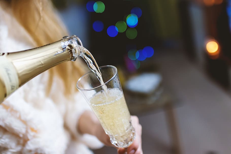 Young girl pours champagne into a glass, food and drink, refreshment HD wallpaper