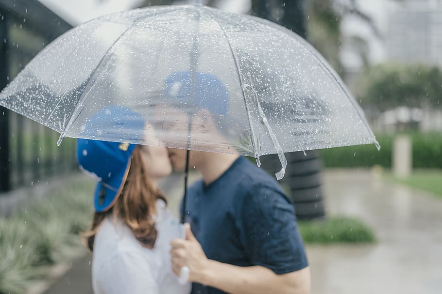 HD wallpaper: Couple Kissing Under Umbrella, man, people, protection, rain  | Wallpaper Flare