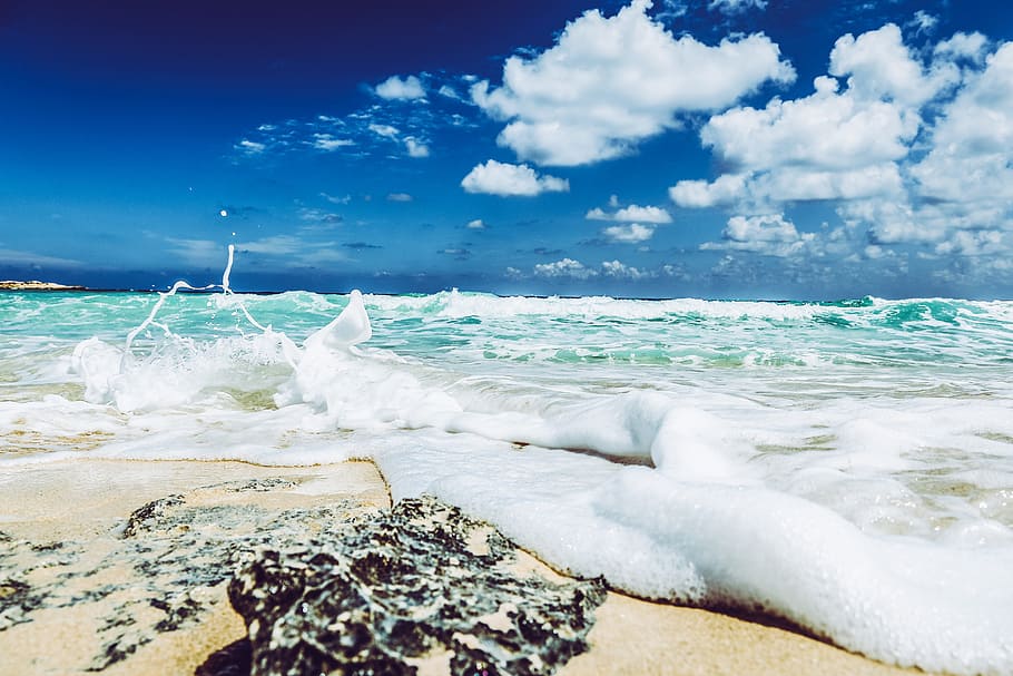 Landscape Photography of Beach With Raging Waves Under Clear Skies HD wallpaper