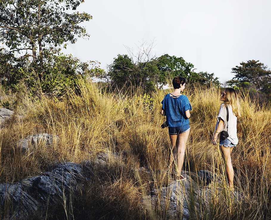 Two Women Standing on Gray Rock, activity, back view, beautiful HD wallpaper