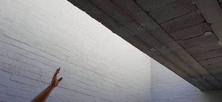 human, person, wall, concrete, reaching, minimalist, grey, diagnonal HD wallpaper