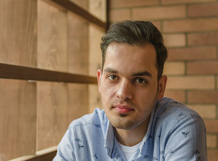 man's face, portrait, headshot, one person, looking at camera HD wallpaper