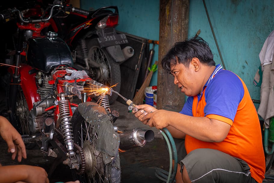 man holding welding torch, workshop, men, occupation, working HD wallpaper