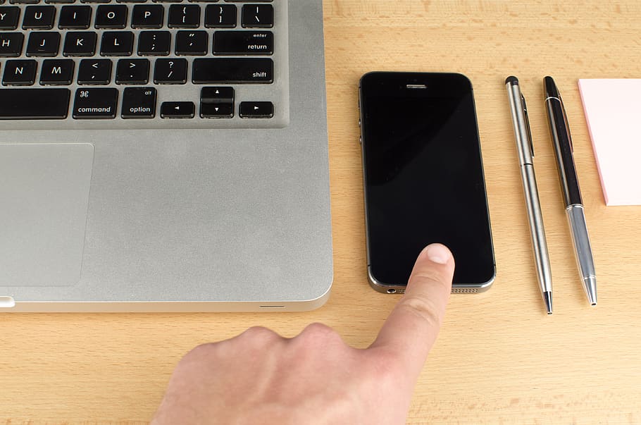 Space Gray Iphone Beside Macbook, cellphone, desk, electronics HD wallpaper
