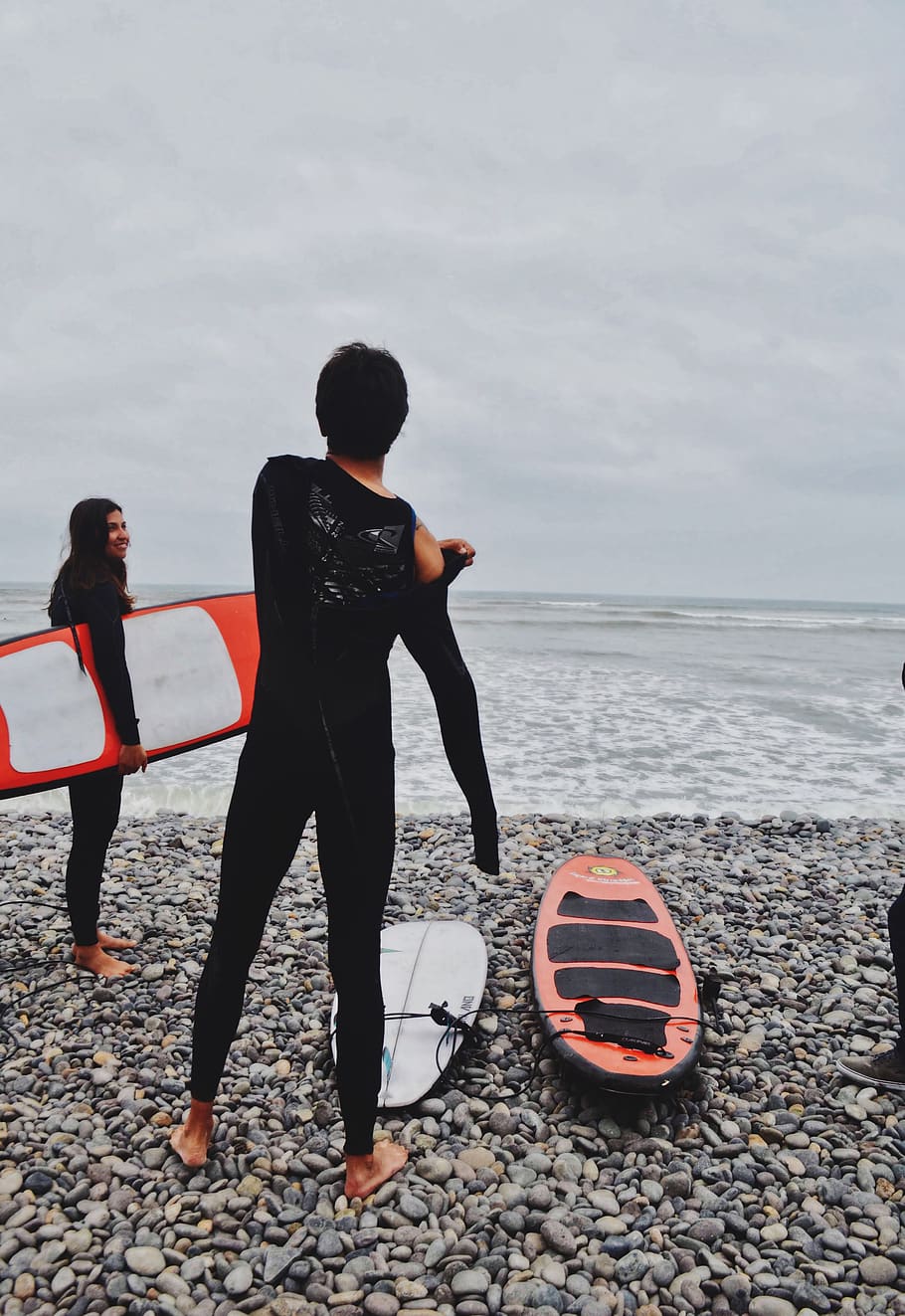 Woman Holding Surfboard , athletes, beach, fun, gear, lima, ocean HD wallpaper