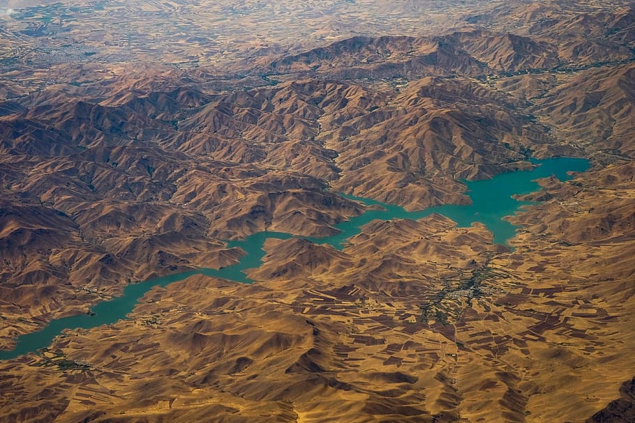 aerial photography of brown mountain, valley, green, blue, landscape