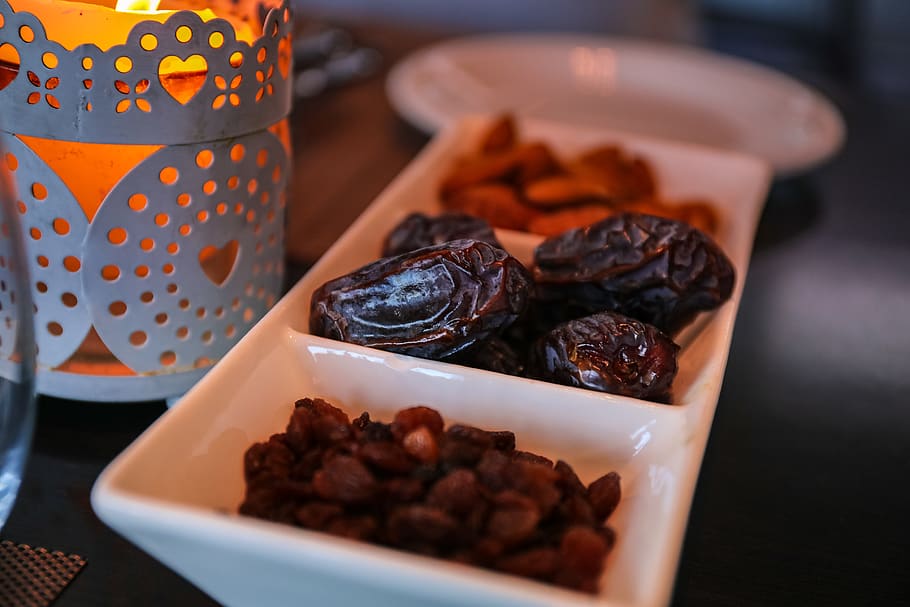 Close-Up Photo of Raisins and Dates, blur, delicious, depth of field