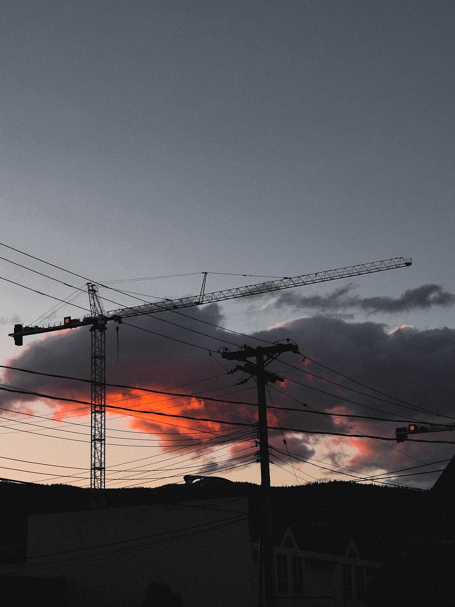 construction crane, cable, power lines, sunset, electric transmission tower HD wallpaper