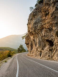 gray concrete road, asphalt, tarmac, highway, nature, cliff, outdoors HD wallpaper