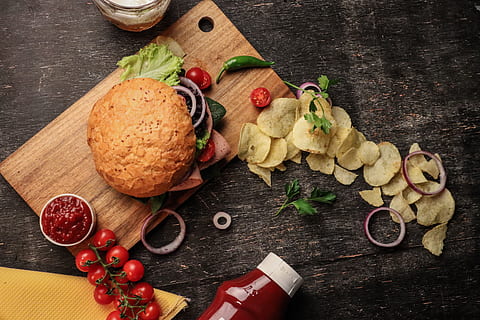 burger on board beside ketchip, plant, bread, fruit, chips, food HD wallpaper