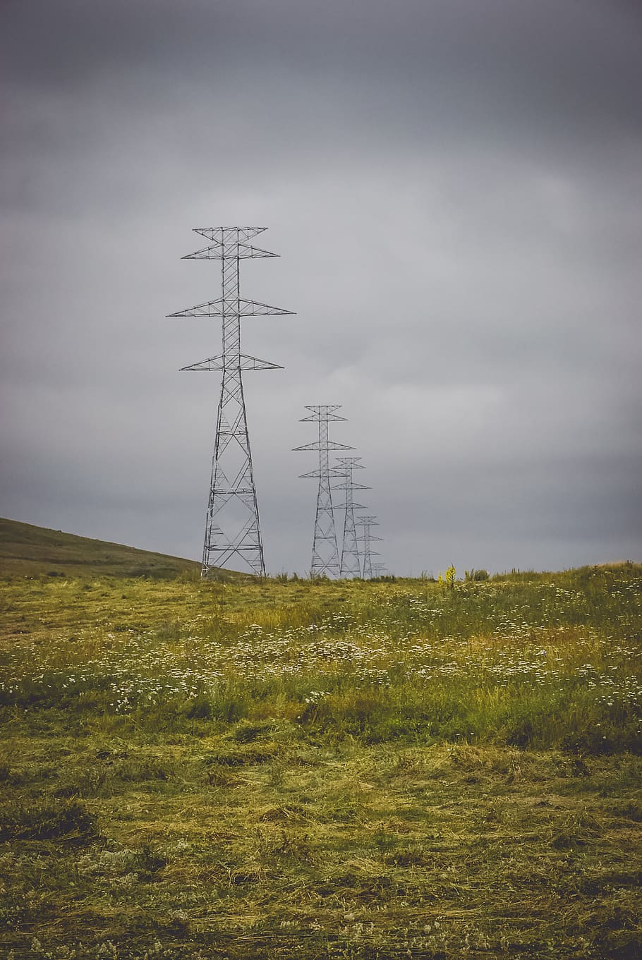 grass field and power electric post towers, sky, land, electricity pylon