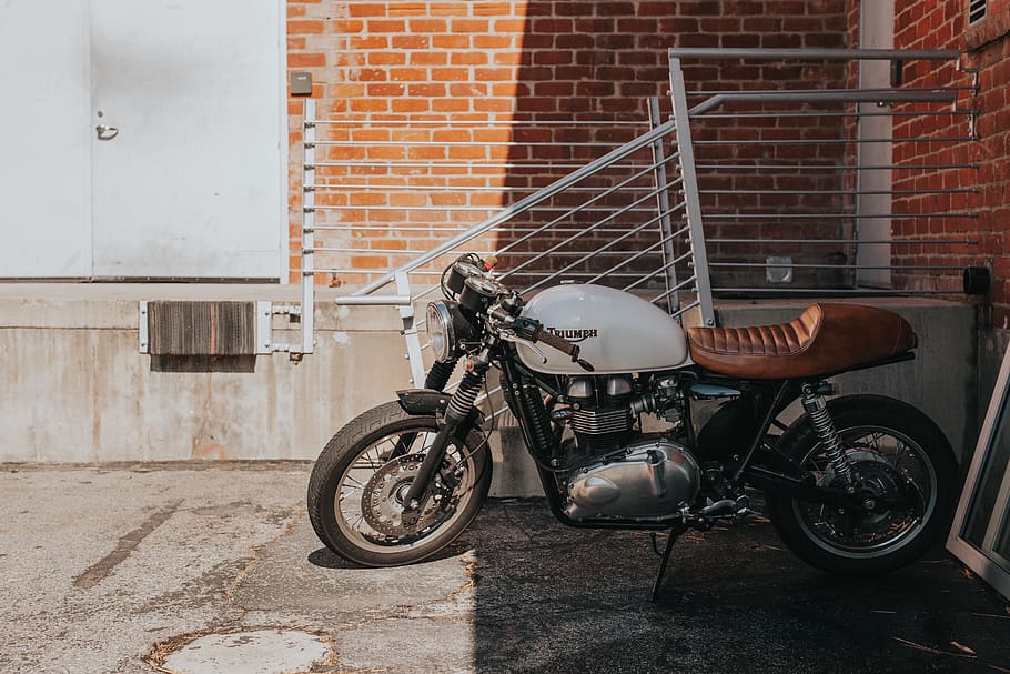 motorcycle, vehicle, parking, outside, building, sunny, day HD wallpaper