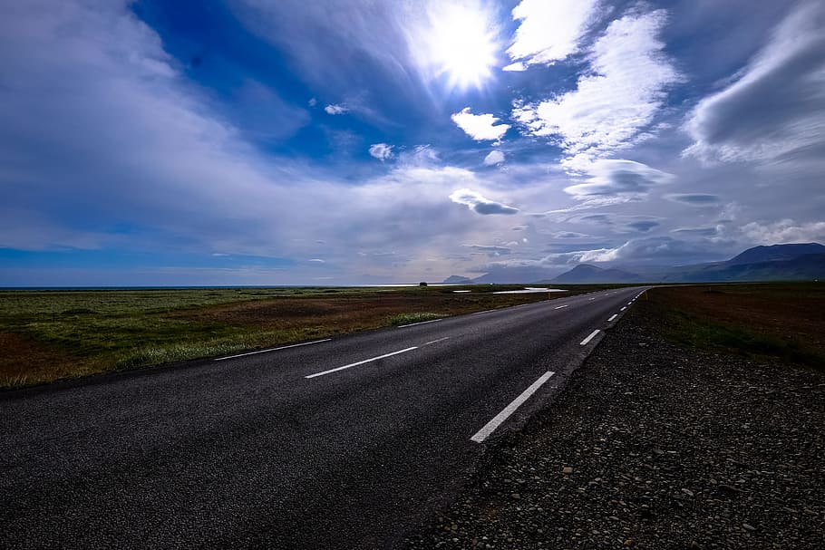 Concrete Road Between Grass Fields, asphalt, clouds, countryside HD wallpaper