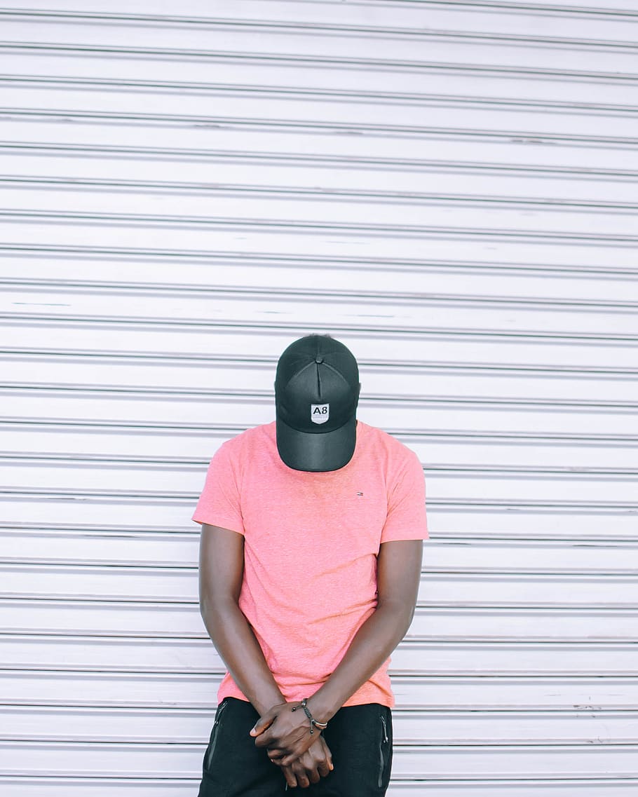 Man Wearing Pink Tee Shirt Leaning on Wall While Head Down, adult, HD wallpaper