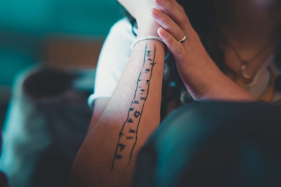 Person's Arm With Tattoo, blur, close-up, design, hand, woman HD wallpaper
