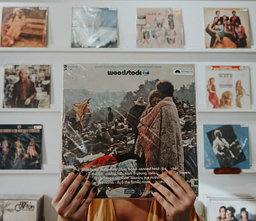 person holding Woodstock record sleeve pack, vinyl, hand, vintage HD wallpaper