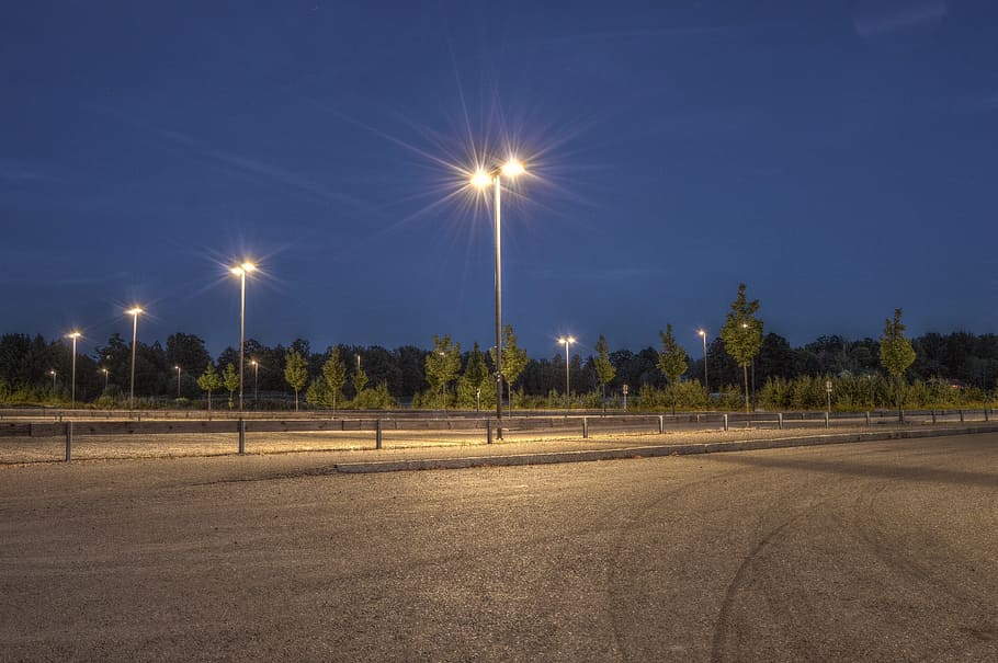 Photography of Empty Field With Post Lamps, dawn, environment