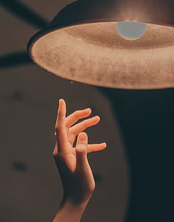 Person About to Touch the Pendant Lamp, close-up, focus, hand HD wallpaper