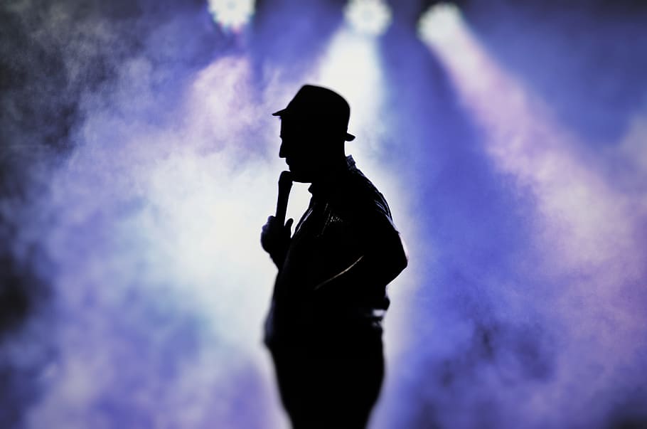 Man Holding Microphone Silhouette, backlit, entertainment, guy HD wallpaper