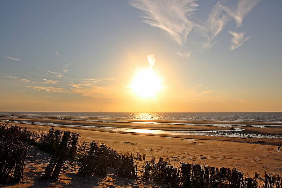 sunset, setting sun, sea, sun and sea, afterglow, sunbeam, evening sky HD wallpaper