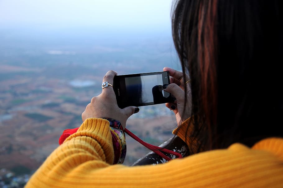 Photo of Woman Taking Picture, blur, capture, cellphone, close-up HD wallpaper