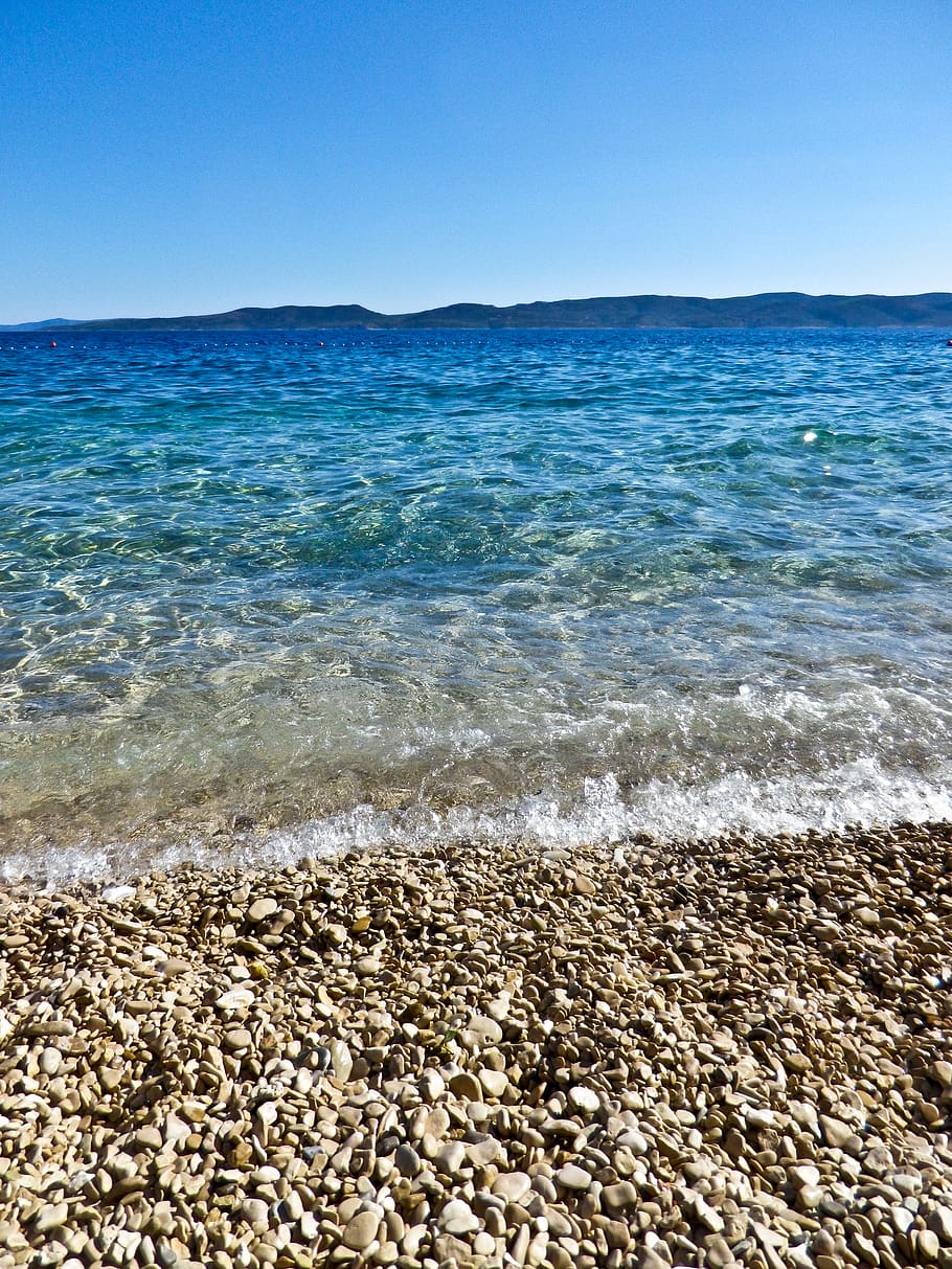 wave, clear, summer, water, sea, pebble, beach, land, sky, beauty in nature HD wallpaper