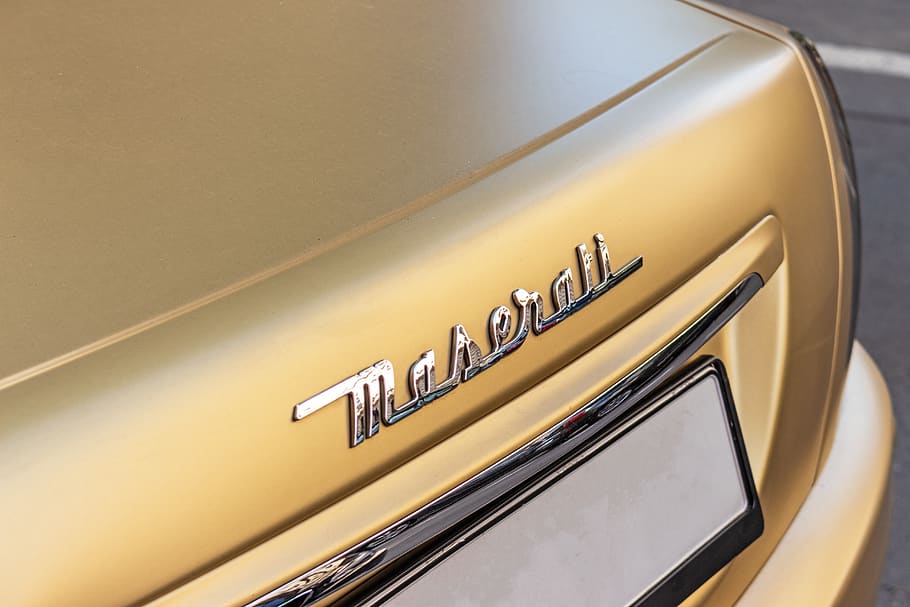 turned-offbrown Maserall digital device, emblem, prague, czechia HD wallpaper