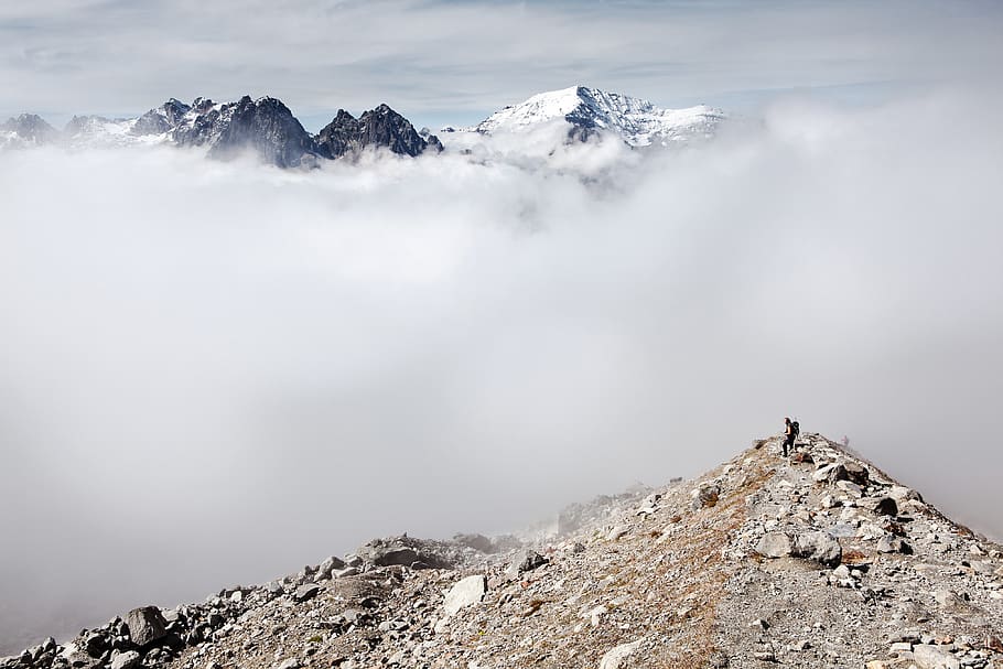 mountain, landscape, rocks, summit, ridge, foggy, clouds, sky HD wallpaper